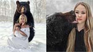 Jovem russa adota urso e faz ensaio fotográfico impressionante; veja fotos