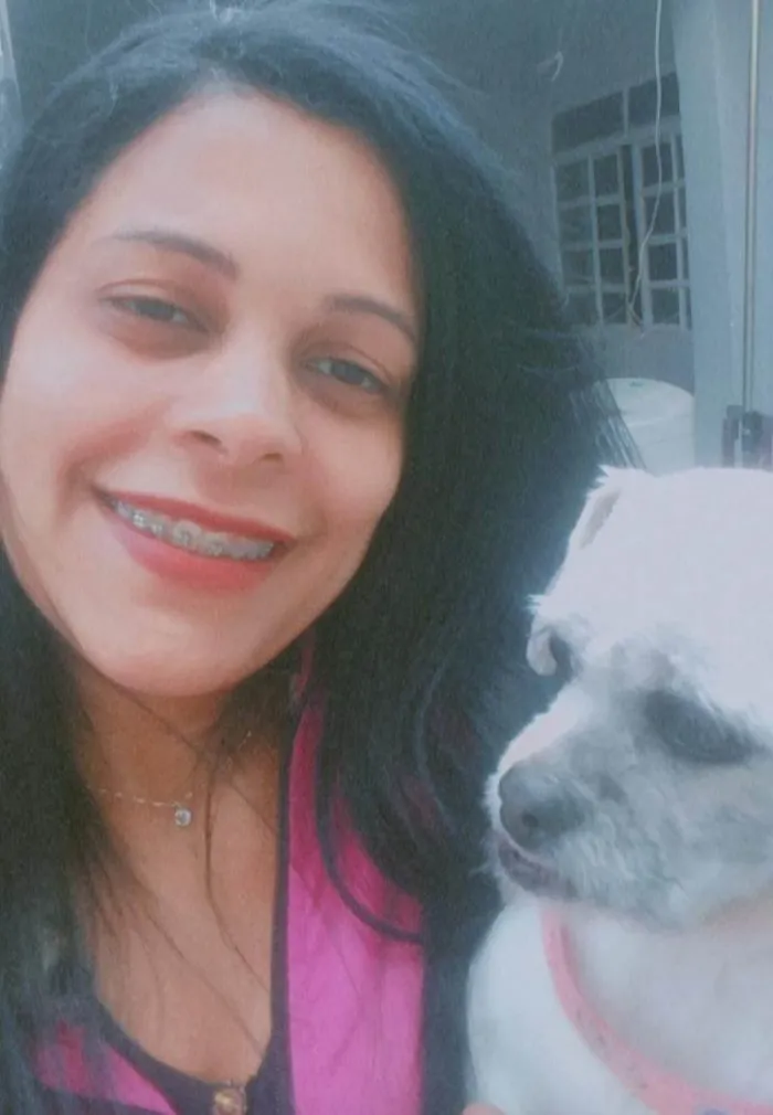 Cachorro ra a Lhasa Apso idade 4 anos nome Mel